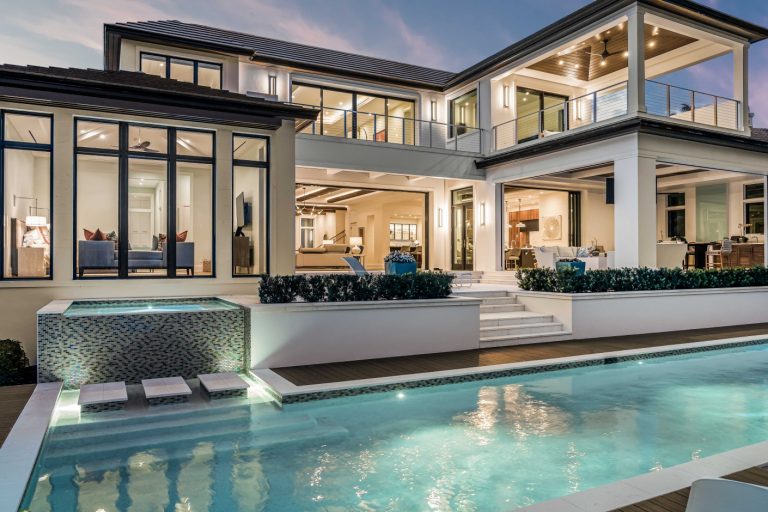 Modern luxury residential home with outdoor pool built by Elevation Builders Group